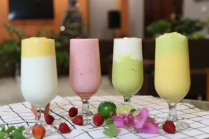 Four healthy smoothies made in a high-speed blender